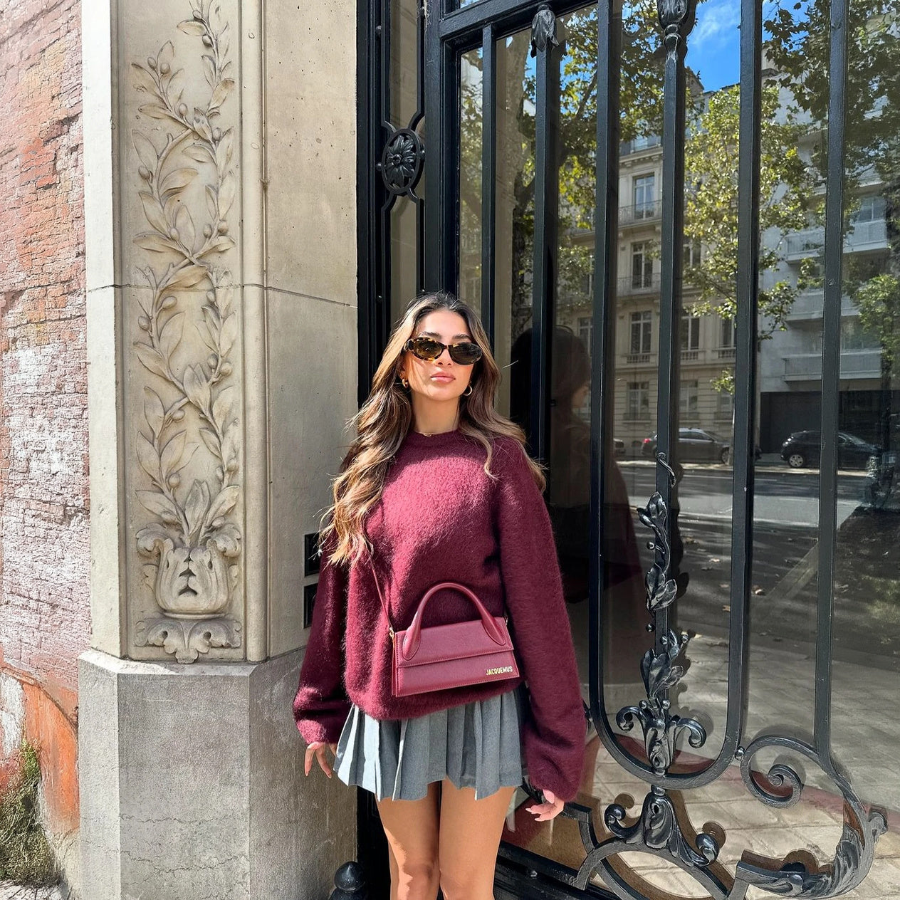 Top Oversize Manga Larga y Falda Plisada