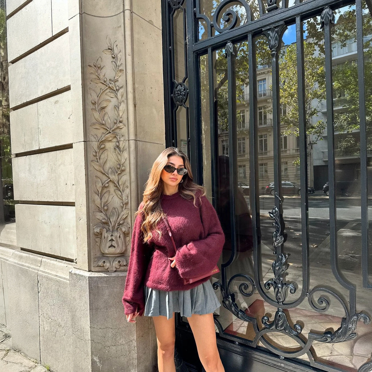 Top Oversize Manga Larga y Falda Plisada