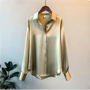 Blusa fluida abotonada de manga larga