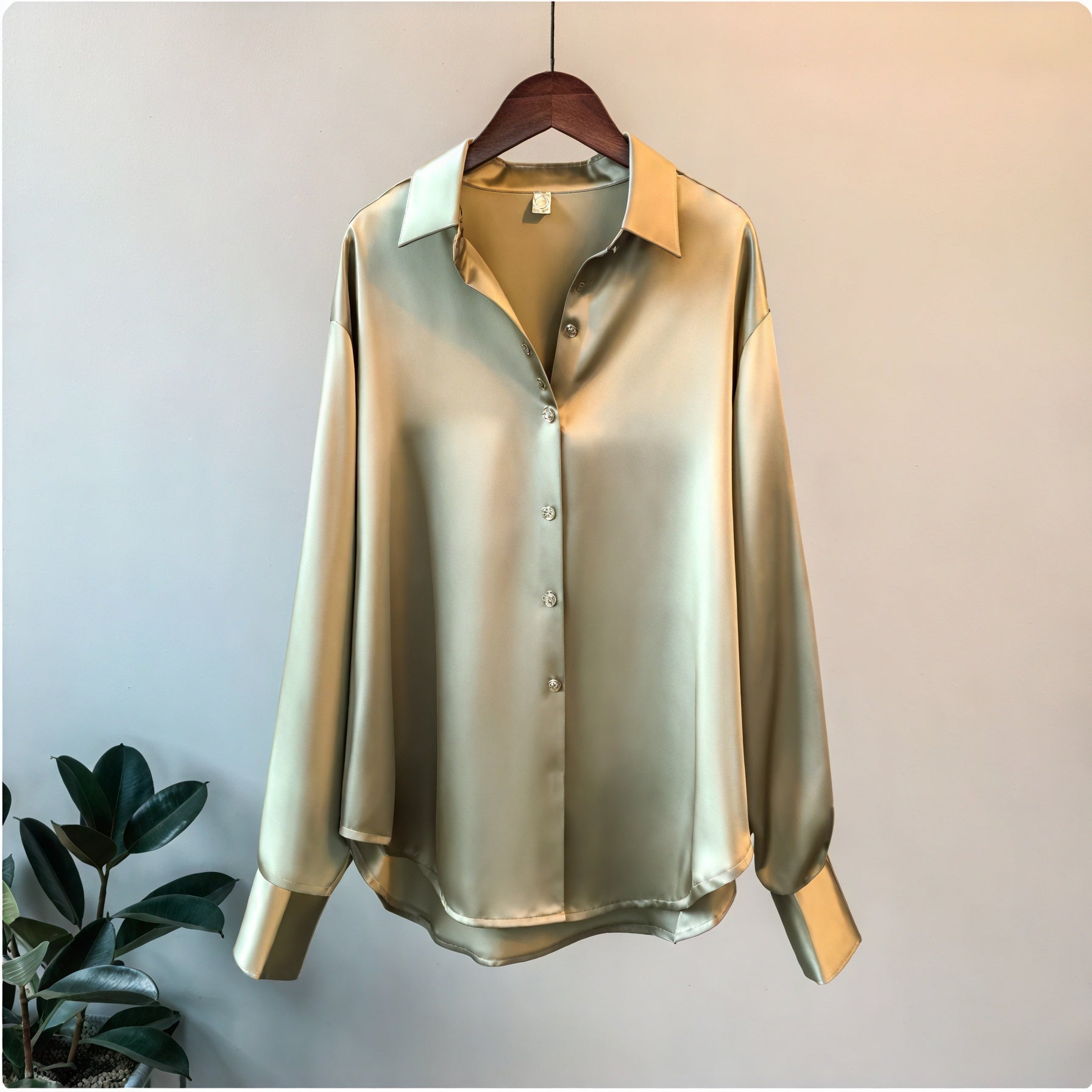 Blusa fluida abotonada de manga larga