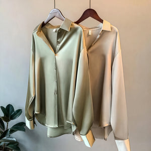 Blusa fluida abotonada de manga larga