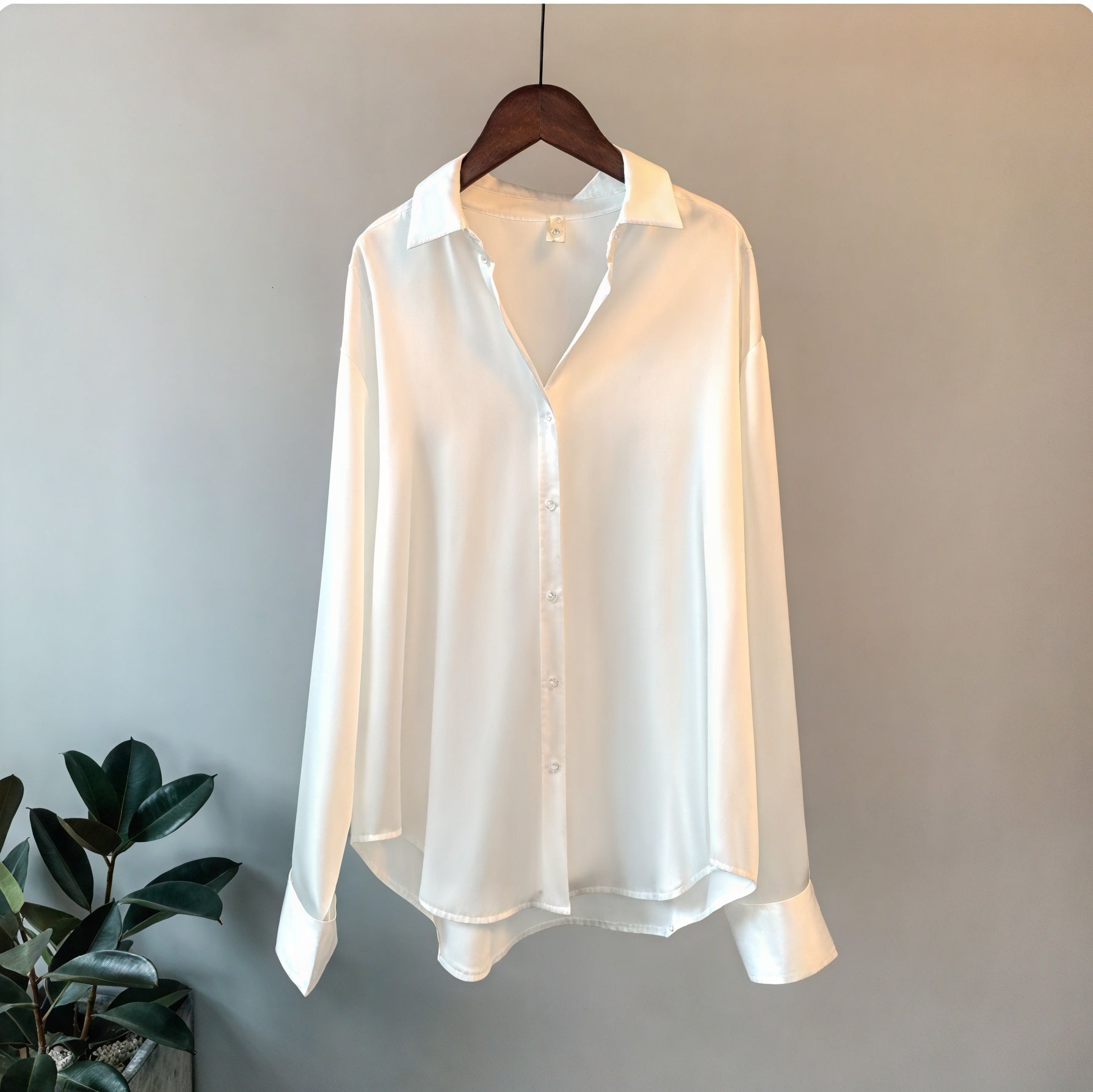 Blusa fluida abotonada de manga larga
