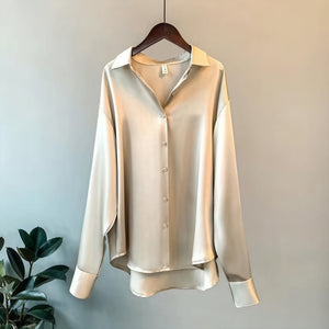Blusa fluida abotonada de manga larga