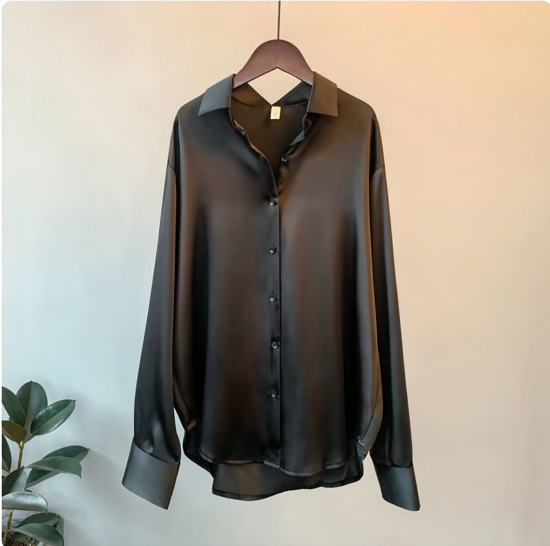 Blusa fluida abotonada de manga larga